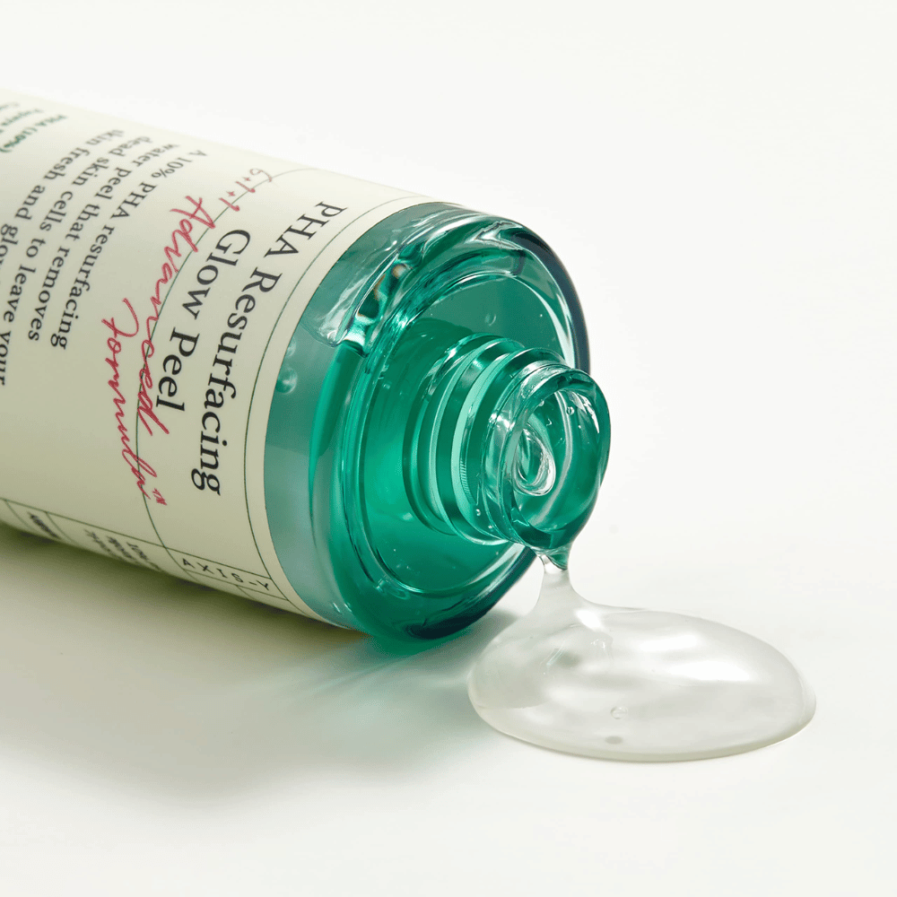 A bottle AXIS - Y PHA Resurfacing Glow Peel 50ml on a smooth surface.
