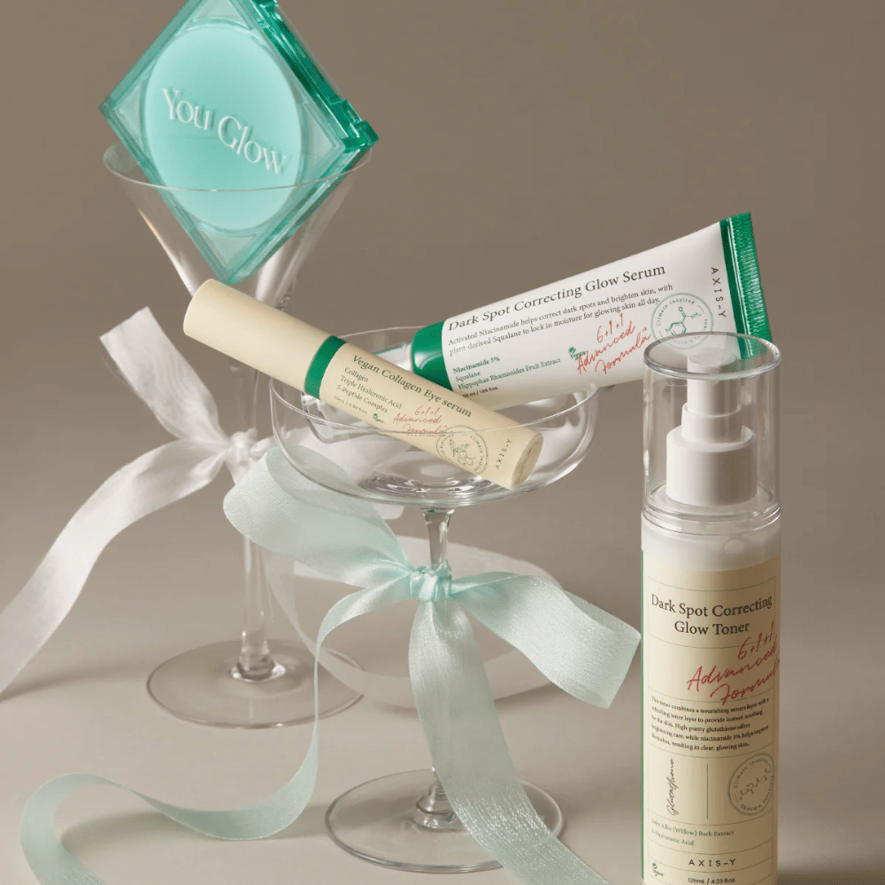 Picture of Skincare kit from AXIS-Y with eye serum, serum, and toner – elegantly placed in cocktail glasses with satin ribbons, perfect for a luxurious gift presentation.