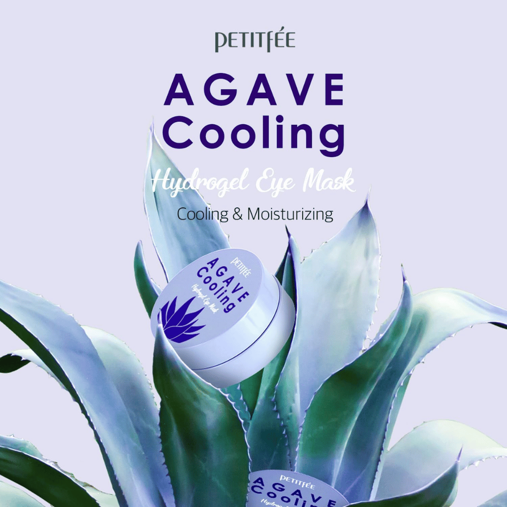 Product image of PETITFEE Agave Cooling Hydrogel Eye Mask placed among large agave leaves. The image highlights cooling and moisturizing properties with a fresh plant-inspired theme.