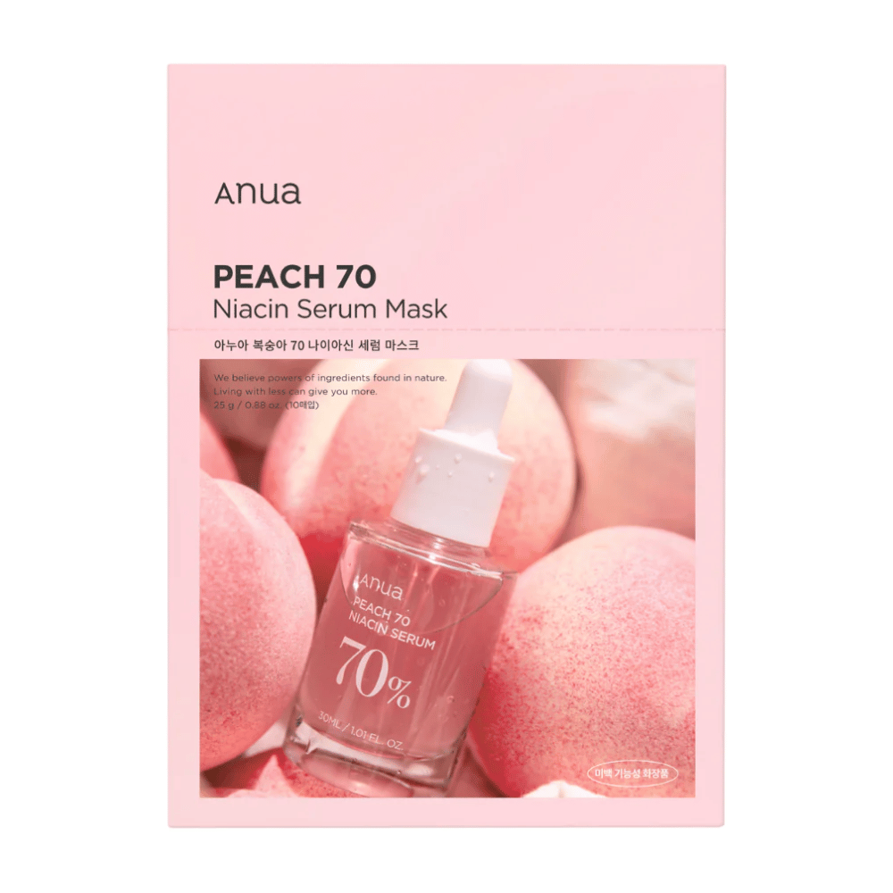 A package of Anua PEACH 70 Niacin Serum Mask in front of a background of peaches. The pink packaging design matches the natural shades of the peaches, and a transparent bottle with serum is partially visible. The product emphasizes the use of ingredients from nature.