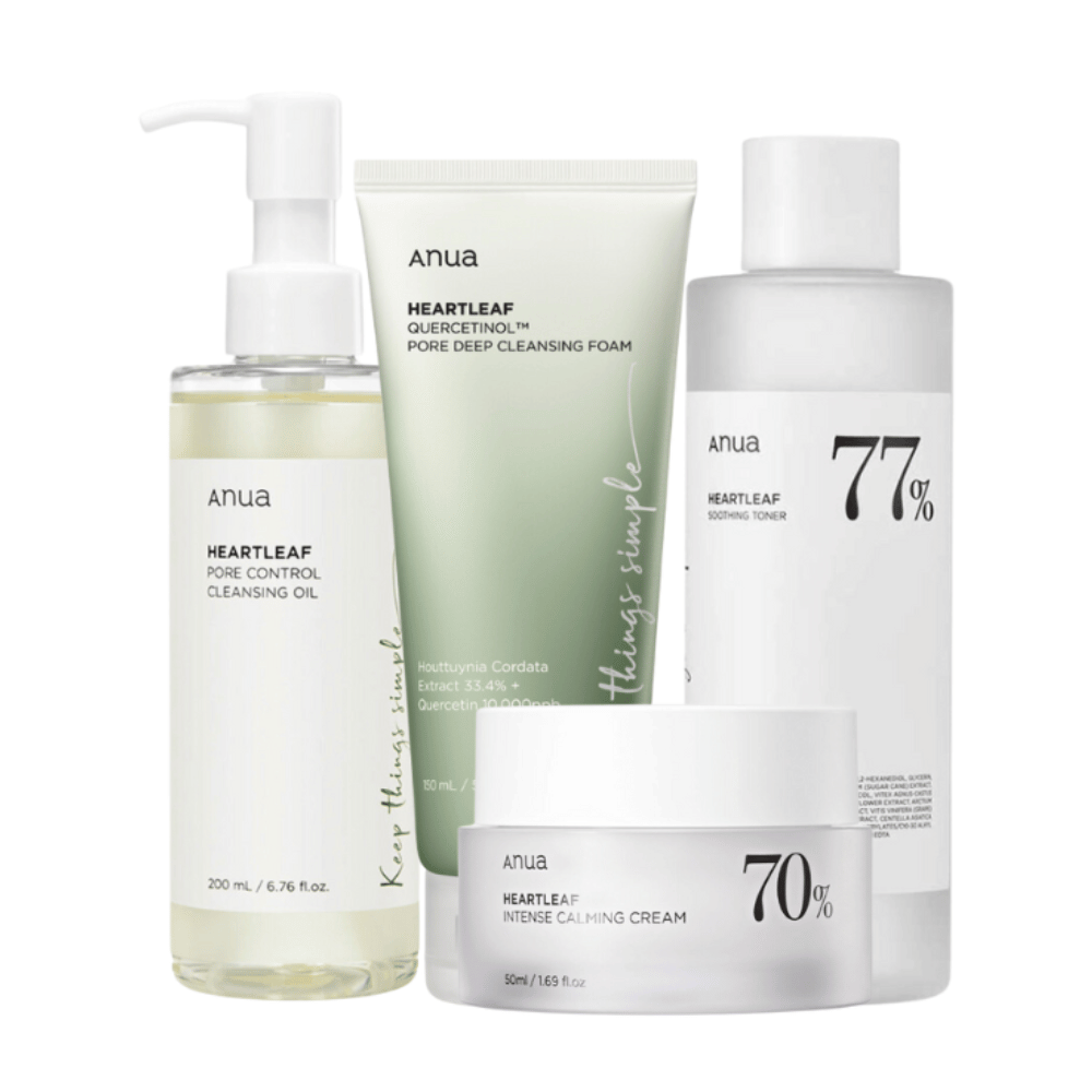 A set of skincare products from Anua, containing Heartleaf Pore Control Cleansing Oil, Heartleaf 77% Soothing Toner, Heartleaf Quercetin+ Pore Deep Cleansing Foam, and Heartleaf 70% Intense Calming Cream. These products are formulated with heartleaf and other soothing ingredients, designed to reduce pores, soothe, and hydrate the skin.