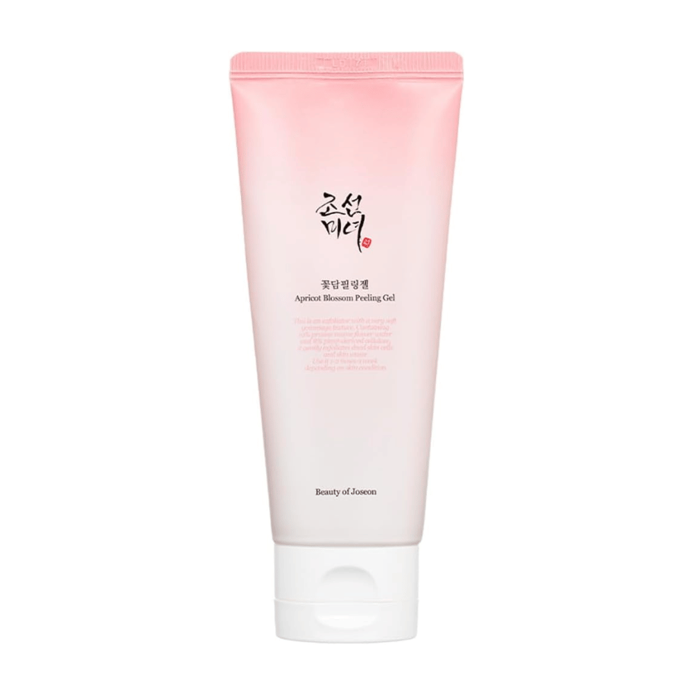 A pink tube with Apricot Blossom Peeling Gel from Beauty of Joseon on a white background.