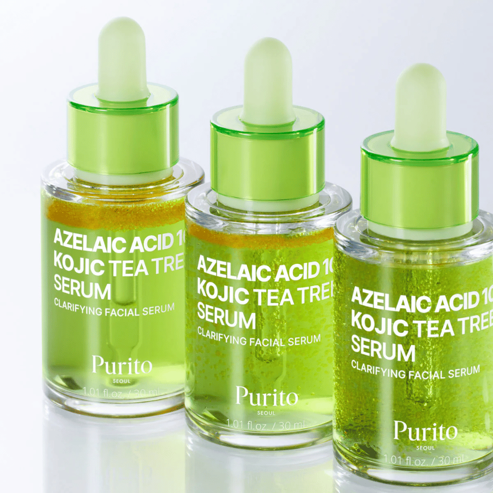 Three bottles of Purito Azelaic Acid 10 Kojic Tea Tree Serum. The formula balances sebum, reduces pores, and provides a more even skin tone.