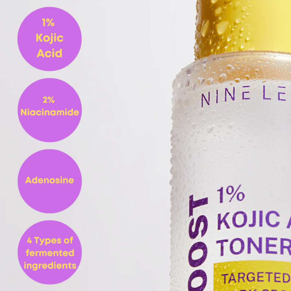 Bottle of NINE LESS B-Boost 1% Kojic Acid Toner with droplets on the surface. Shows key ingredients: 1% Kojic Acid, 2% Niacinamide, Adenosine, and 4 types of fermented ingredients against dark spots.