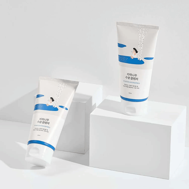 ROUND LAB Birch Juice Moisturizing Cleanser in two tubes on a white background, mild and moisturizing facial cleanser with birch sap that gently cleanses and suits all skin types, even sensitive skin.