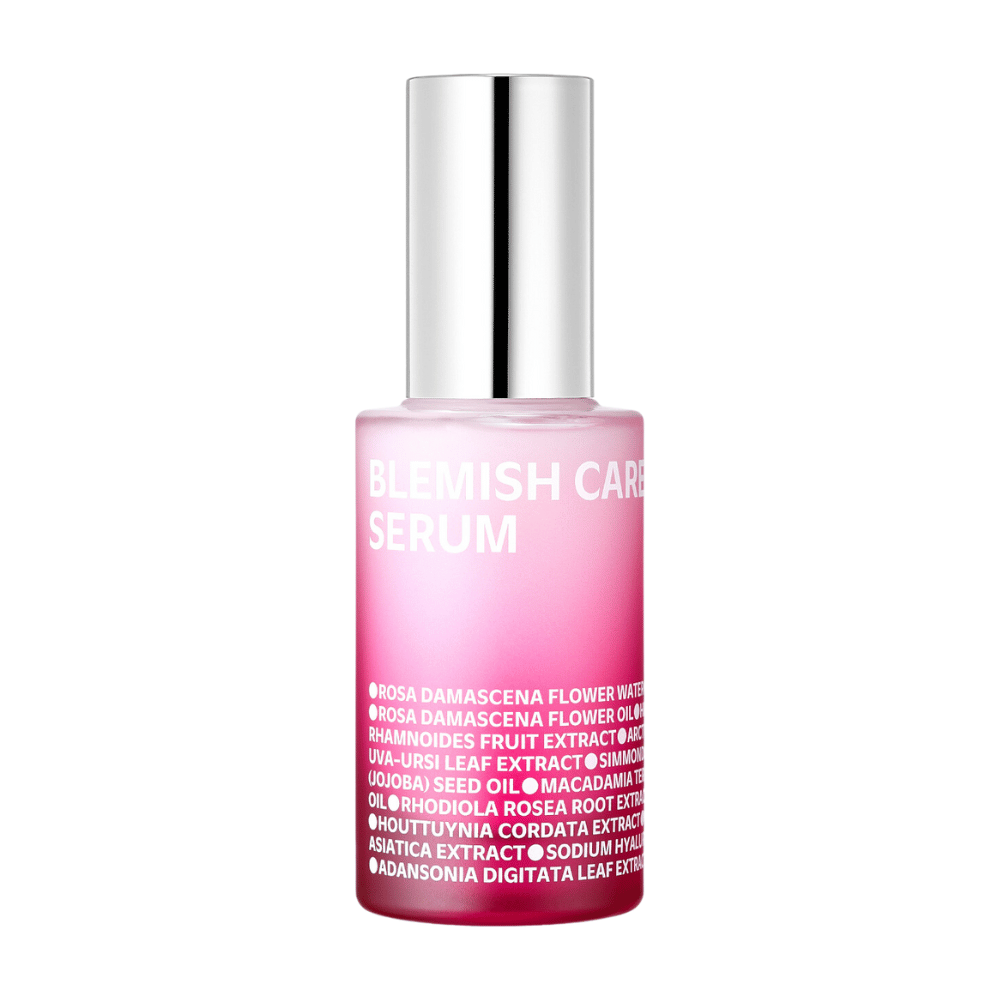 A single bottle of Blemish Care Serum with a gradient pink design and silver-colored cap, standing against a white background. The text on the bottle lists ingredients such as rose water, oils, and extracts, printed in white on the front.