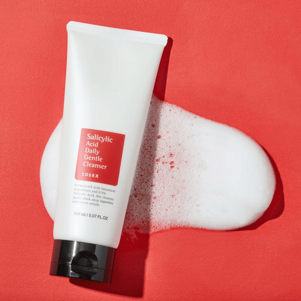 COSRX Salicylic Acid Daily Gentle Cleanser 150ml – effective facial cleanser with salicylic acid against acne, blackheads, and impure skin, shown with foam.
