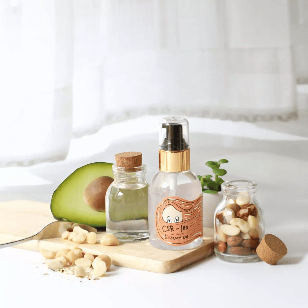 Elizavecca CER-100 Hair Muscle Essence Oil – Korean hair oil with avocado and natural oils that helps moisturize, strengthen, and add shine to dry and damaged hair.
