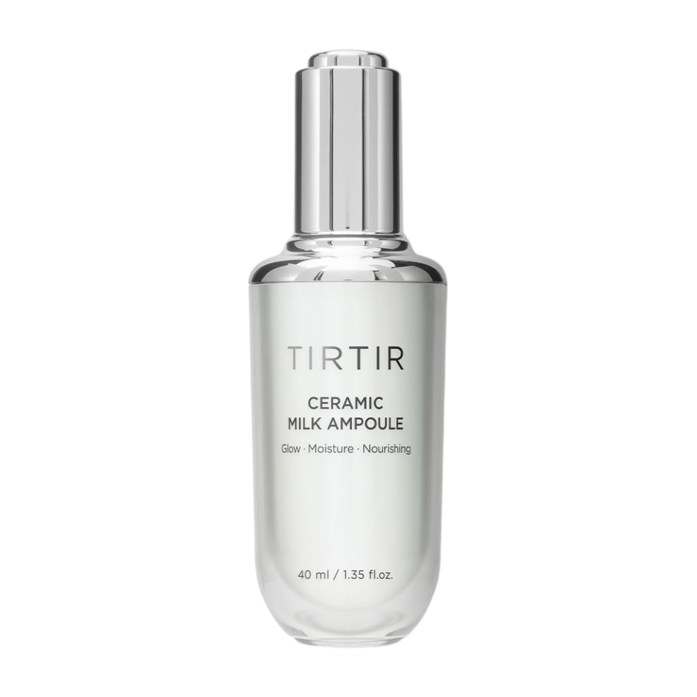  A transparent bottle TIRTIR Ceramic Milk Ampoule, labeled with "Glow - Moisture - Nourishing", on a white background.