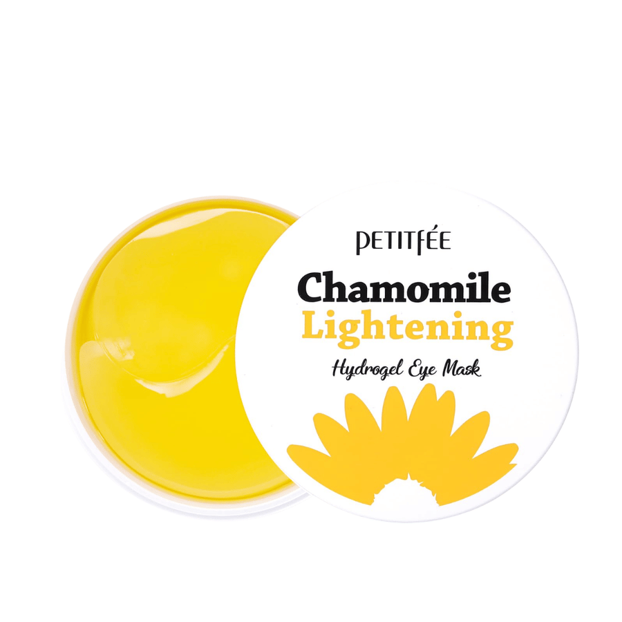 Cutout product image of PETITFEE Chamomile Lightening Hydrogel Eye Mask with an opened jar showing the yellow hydrogel patches and the sleek white packaging.