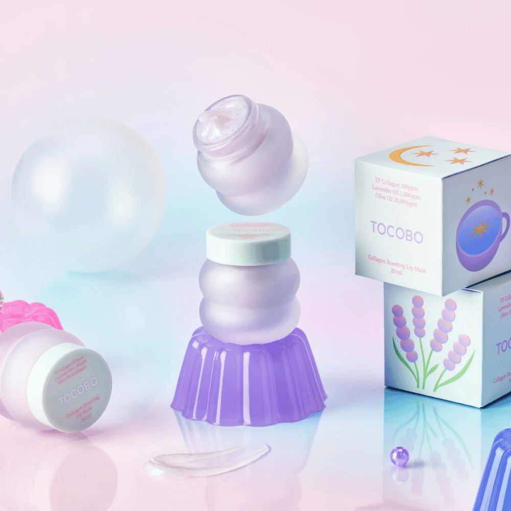Several jars of TOCOBO Collagen Boosting Lip Mask with an imaginative pastel-colored background.