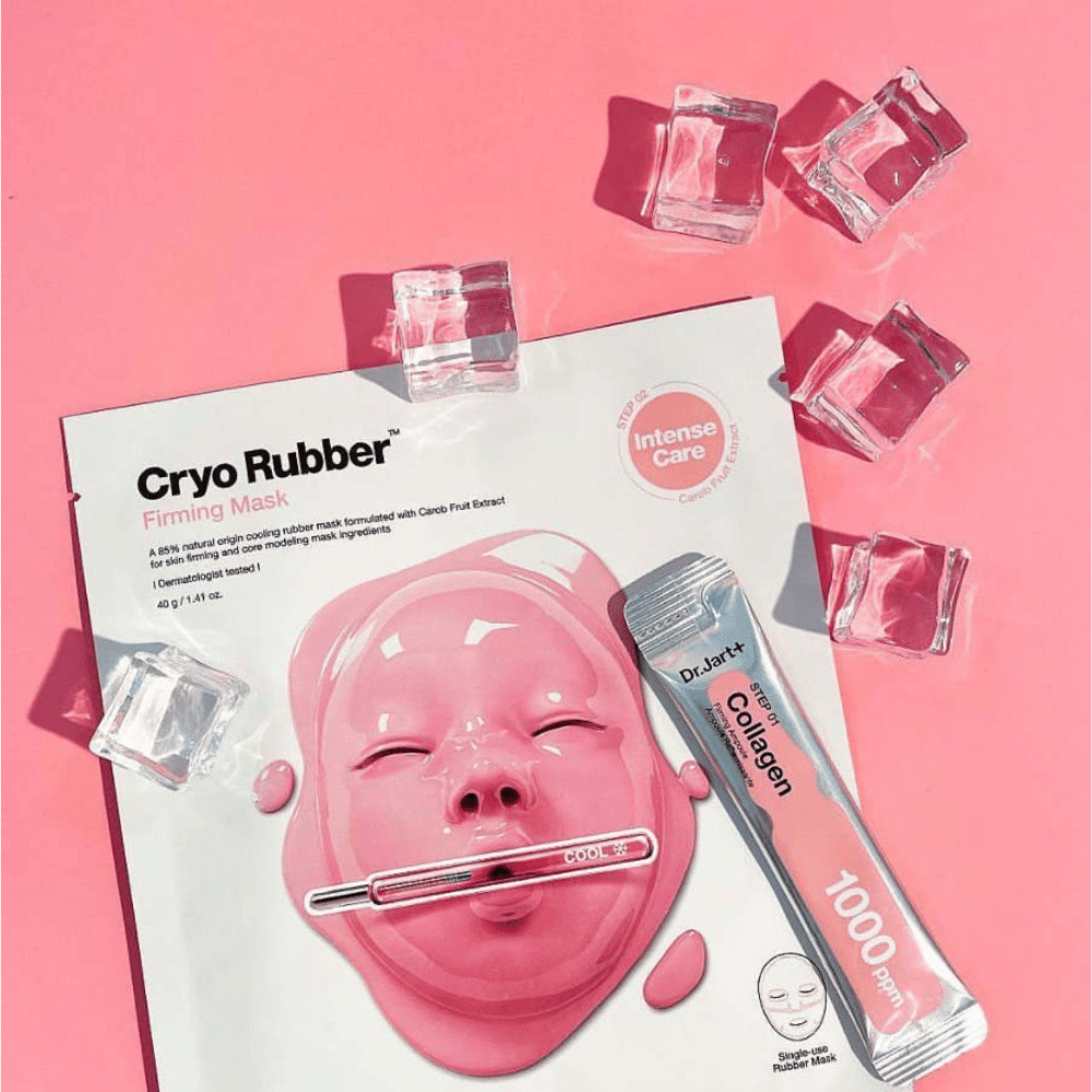 A Dr.Jart+ product image of Cryo Rubber™ Firming Mask surrounded by ice cubes on a pink background, along with a tube labeled "Collagen 1000 ppm".