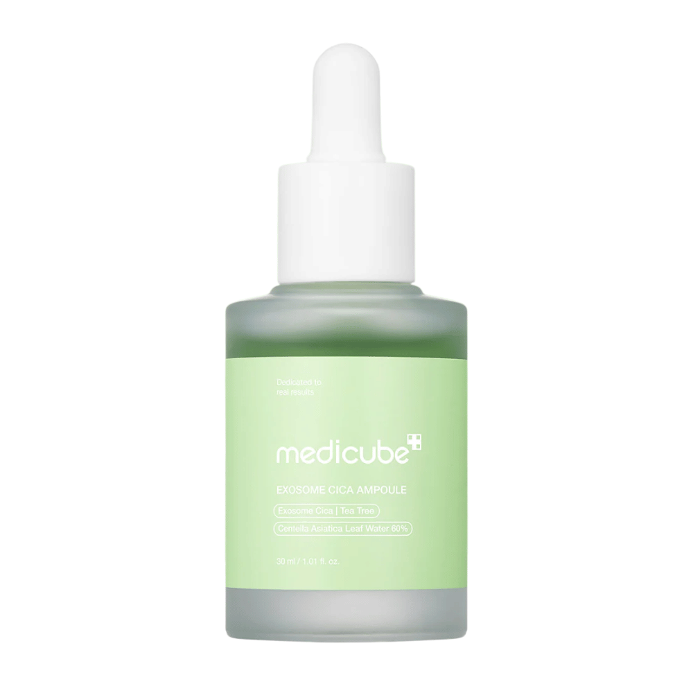 Close-up of Medicube Exosome Cica Ampoule in frosted glass with green label and dropper cap.