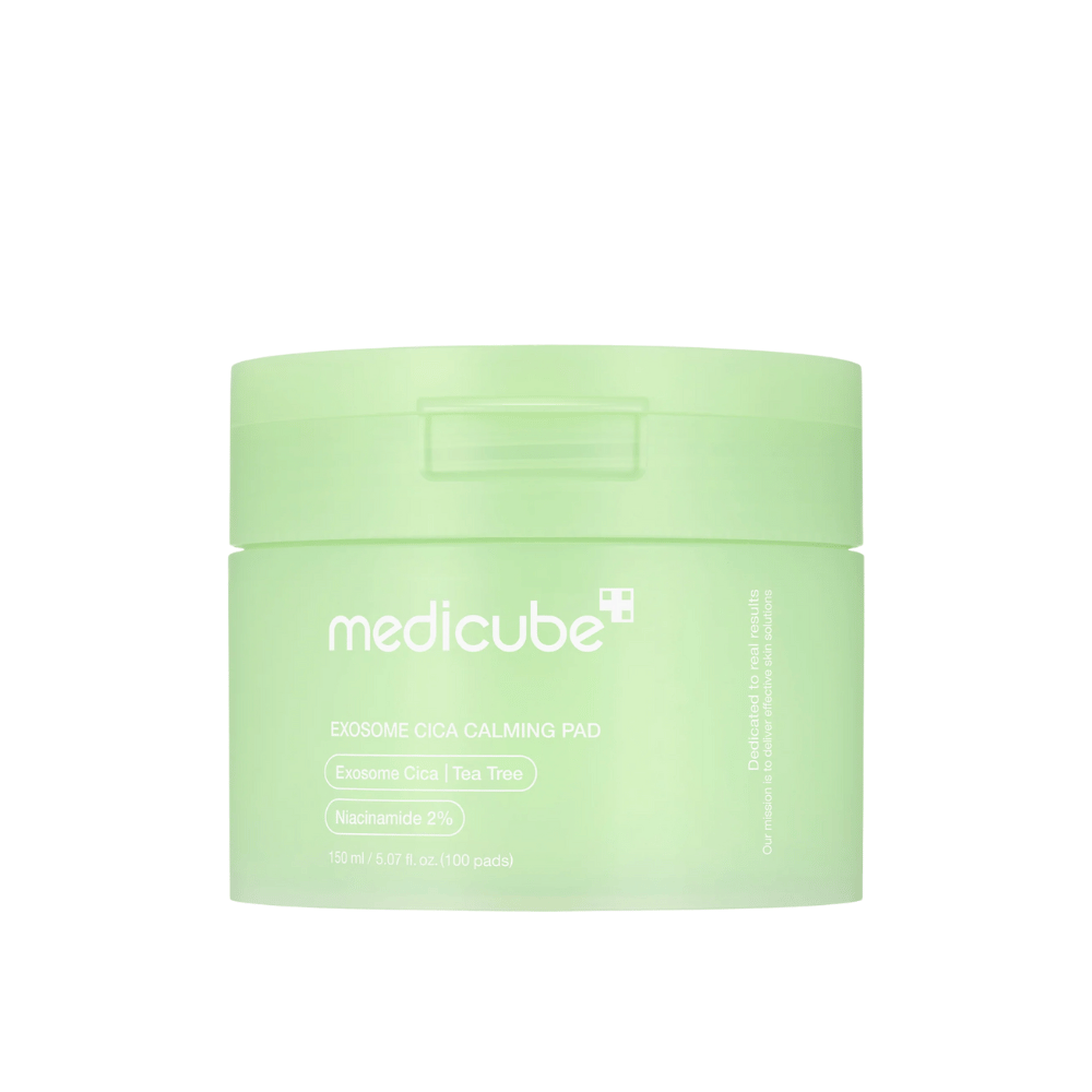 Close-up of Medicube Exosome Cica Calming Pads in a light green jar, 150 ml/100 pads for soothing and moisturizing skincare.