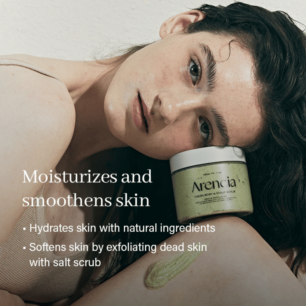 Model rests with Arencia Fresh Cloud Body & Scalp Scrub. Moisturizing body scrub that softens the skin, gently exfoliates, and strengthens the skin's natural balance.