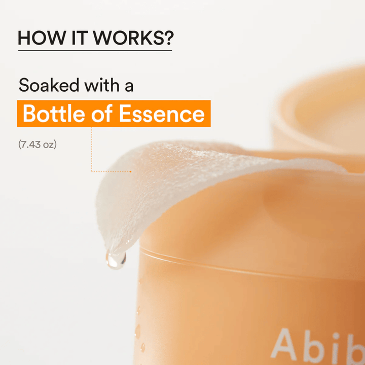 Close-up of hydrating toner pad soaked in essence from Abib Glutathiosome Dark Spot Pad Vita Touch.