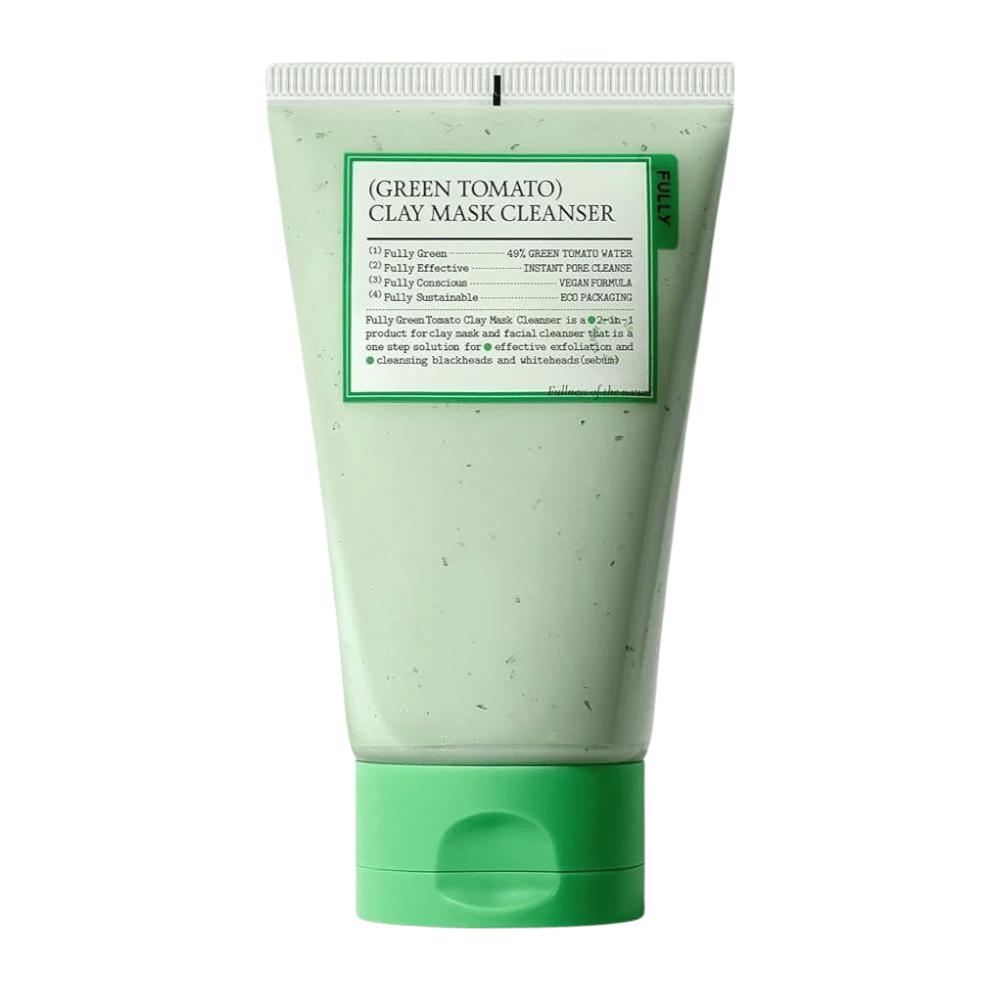 A product image of Green Tomato Clay Mask Cleanser in a green tube against a white background. The focus is on the packaging and design.