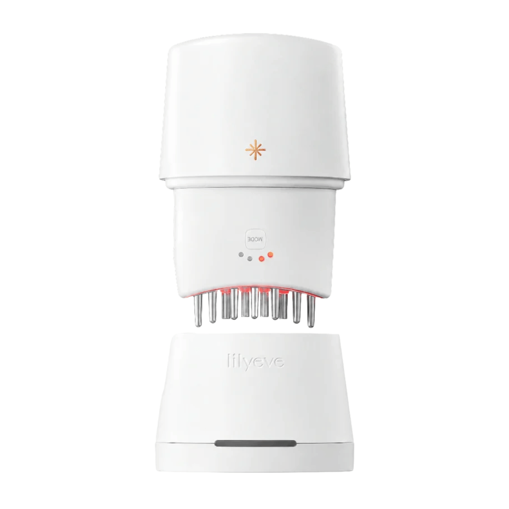 5. Lilyeve GrowTurn Pro – white scalp device with red LED light and accompanying charging station