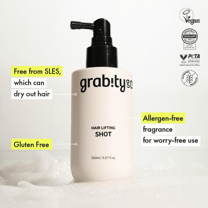 Grabity Hair Lifting Shot in a white spray bottle with information about a vegan formula, PETA approval, SLES-free composition, gluten-free formula, and allergen-free fragrance for gentle hair care.