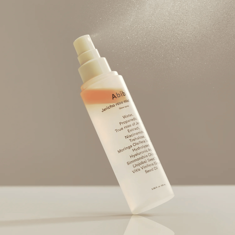 Abib Jericho Rose Mist Serum is sprayed into the air. Light and fresh mist with rose and moringa oil for a natural glow.