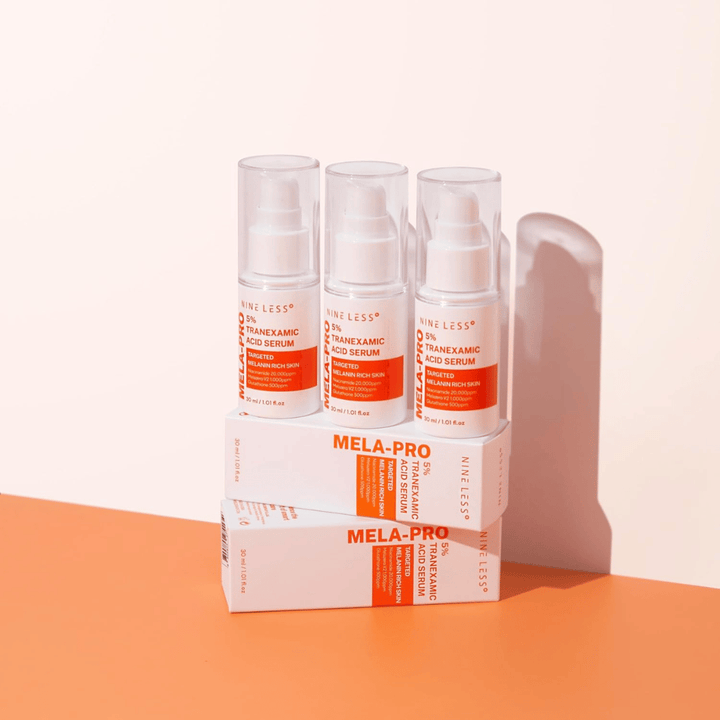 Three NINE LESS MELA-PRO 5% Tranexamic Acid Serum 30 ml, brightening serum with niacinamide and glutathione for melanin-rich skin.