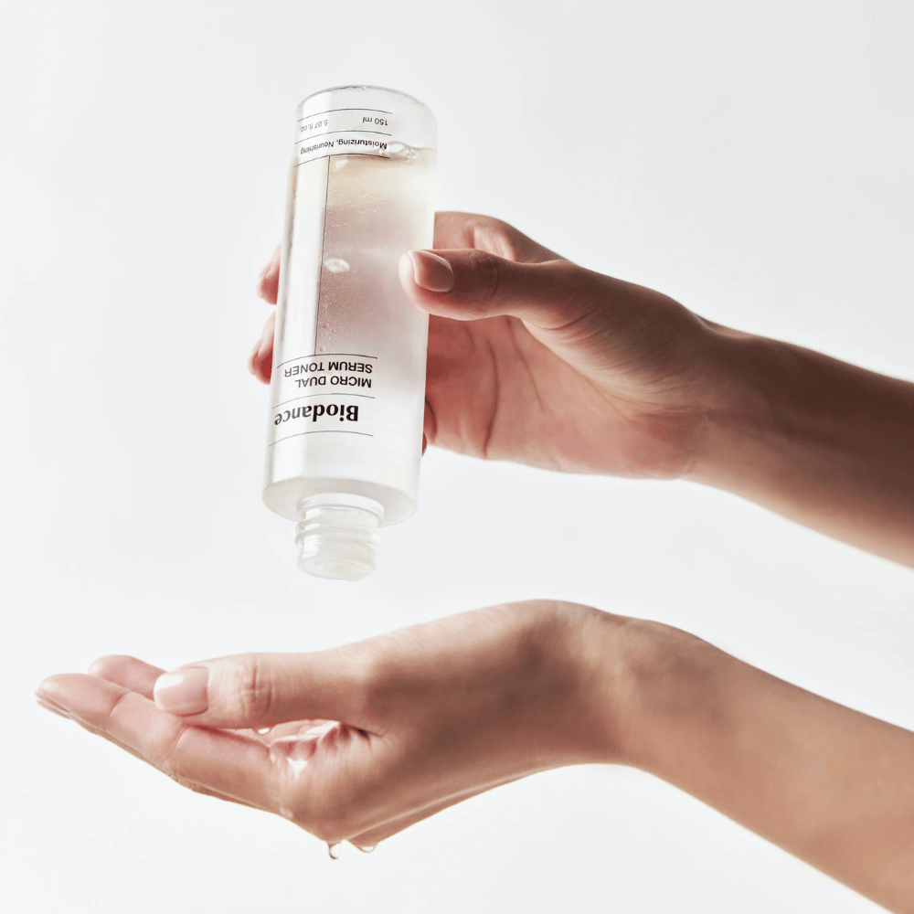 Biodance Micro Dual Serum Toner applied in the hand – moisturizing and nourishing facial toner with serum feel for dry and sensitive skin