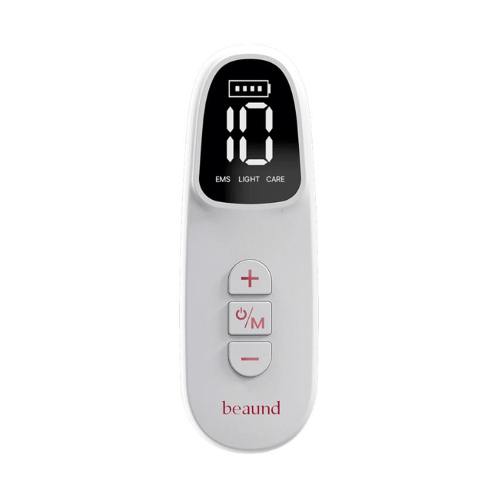Close-up of the remote control for Beaund Neckcera. The digital display shows battery level and settings for EMS, light therapy, and care programs.