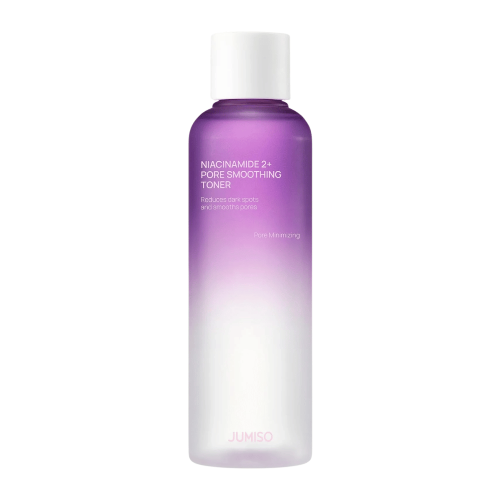 Product image of JUMISO Niacinamide 2+ Pore Smoothing Toner on a light background. The purple and white bottle highlights the product's focus on pore refinement, a more even skin tone, and reduced visibility of dark spots.