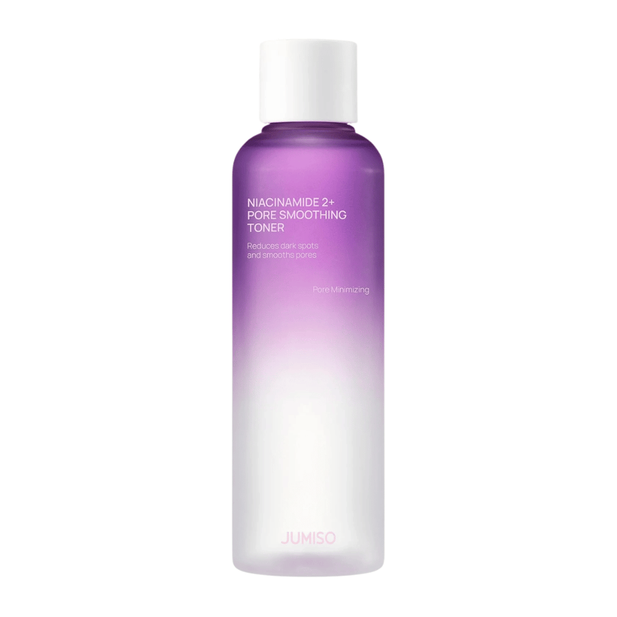 Product image of JUMISO Niacinamide 2+ Pore Smoothing Toner on a light background. The purple and white bottle highlights the product's focus on pore refinement, a more even skin tone, and reduced visibility of dark spots.