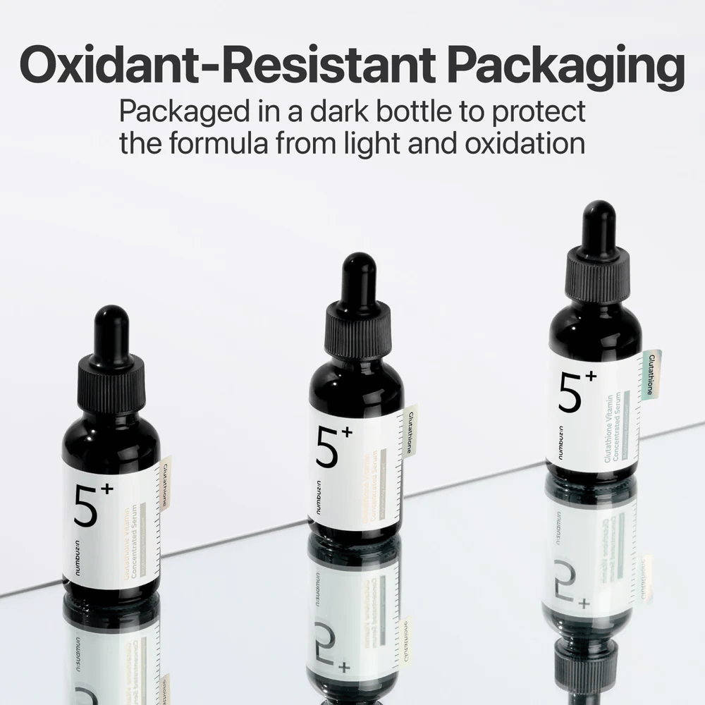 Three bottles of Numbuzin No.5+ Glutathione Vitamin Concentrated Serum in dark packaging that protects against oxidation.