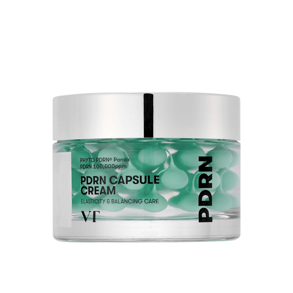 VT PDRN Capsule Cream in a transparent jar with a silver lid. The contents consist of green capsules in a clear gel, and the label indicates that the cream is intended for elasticity and balancing skincare.