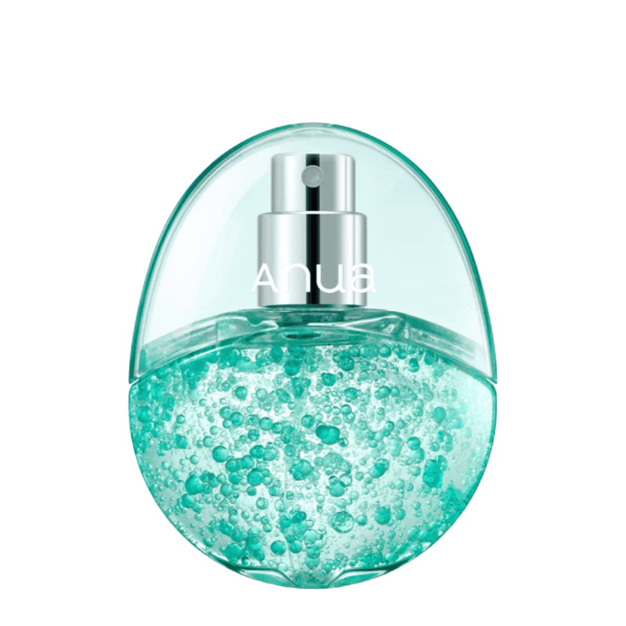 Cut-out product image of Anua PDRN Hyaluronic Acid Hydrating Capsule Mist against a light background. The egg-shaped bottle has a transparent upper part and a lower part filled with turquoise moisturizing capsules that highlight the product's unique formulation and premium feel.