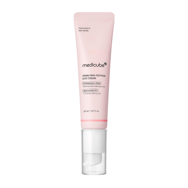 Medicube PDRN Pink Peptide Eye Cream in pink tube, 30 ml. Eye cream with PDRN and 5% niacinamide that revitalizes tired skin under the eyes and gives a firmer appearance.