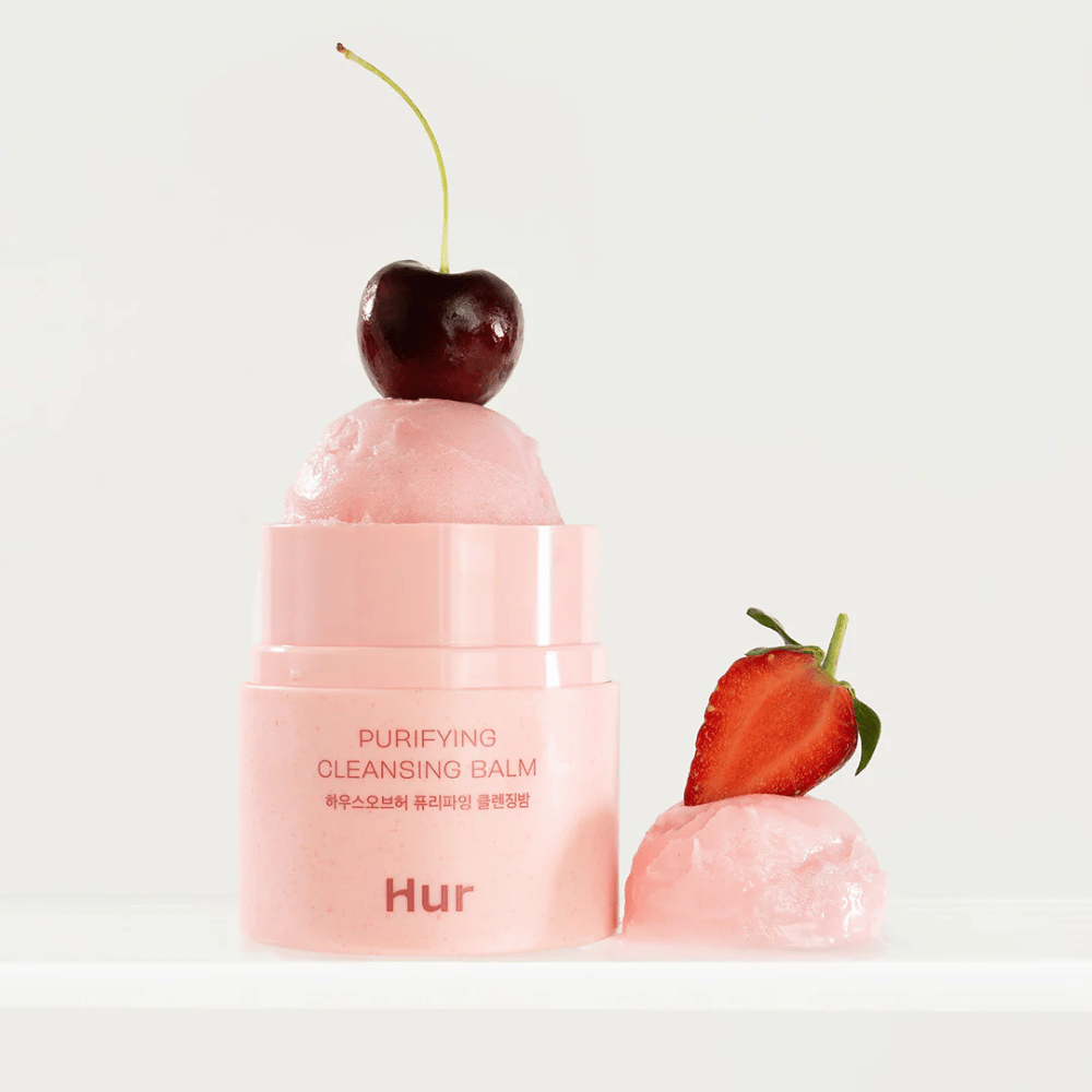 Open How Purifying Cleansing Balm with sorbet-like texture decorated with cherries and strawberries. Fruit-inspired cleansing balm with softening and cleansing properties.