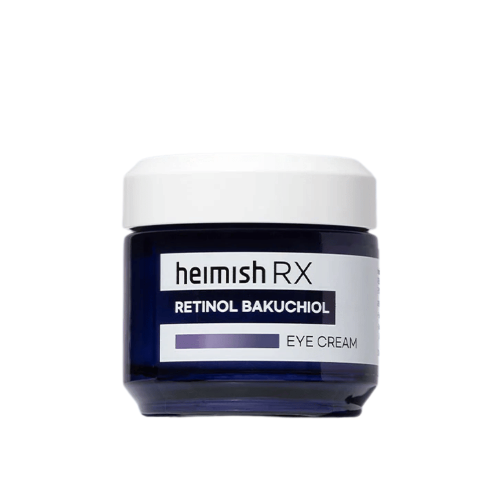 Heimish RX Retinol Bakuchiol Eye Cream in a dark blue jar with a white lid. An eye cream enriched with retinol and bakuchiol for smoother and firmer skin around the eyes.