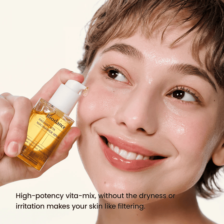 Model with radiant skin after using Biodance Radiant Vita Niacinamide Serum for clearer and more even skin