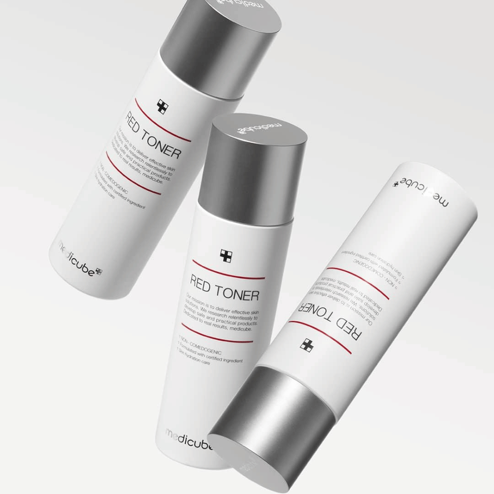 Three bottles of medicube Red Toner with silver caps – a moisturizing and pore-tightening toner developed for sensitive and acne-prone skin.