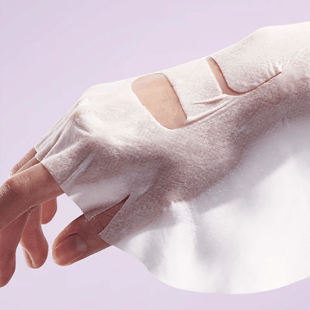 The image shows a hand with a "Retinol Intense Reactivating Mask" applied on the skin. It is a beauty product for skincare.