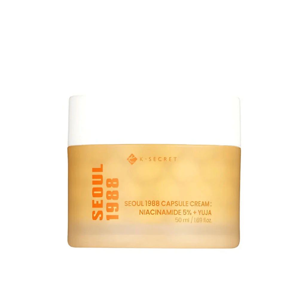 Jar with K-Secret Seoul 1988 Capsule Cream Niacinamide 5% + Yuja, 50 ml, in gold-colored designed packaging.