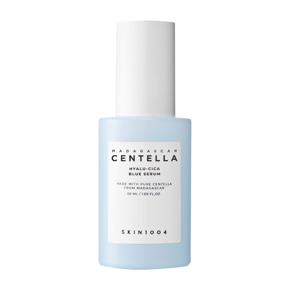 A bottle SKIN1004 Madagascar Centella Hyalu-Cica Blue Serum with a light blue label and white cap on a clean background.