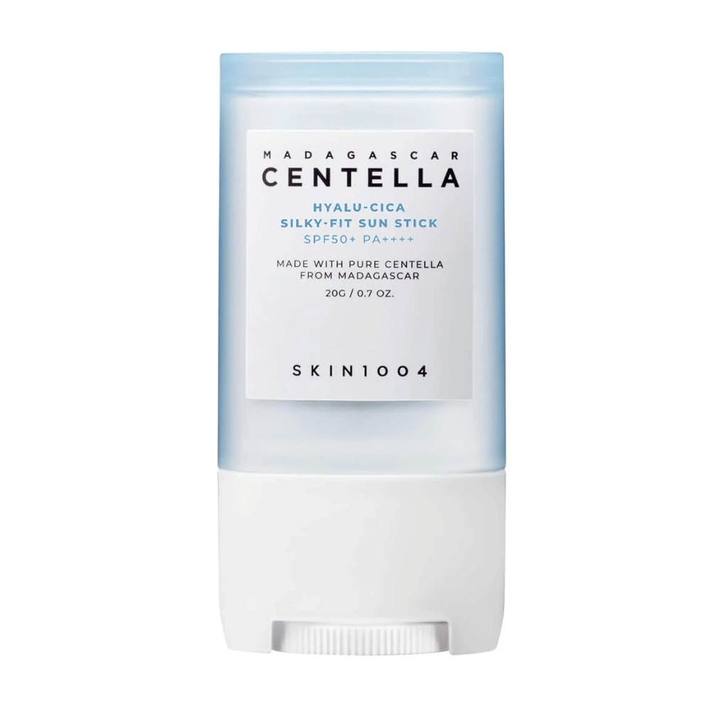Closed sunscreen stick from SKIN1004, SPF50+, with centella from Madagascar, against a white background.