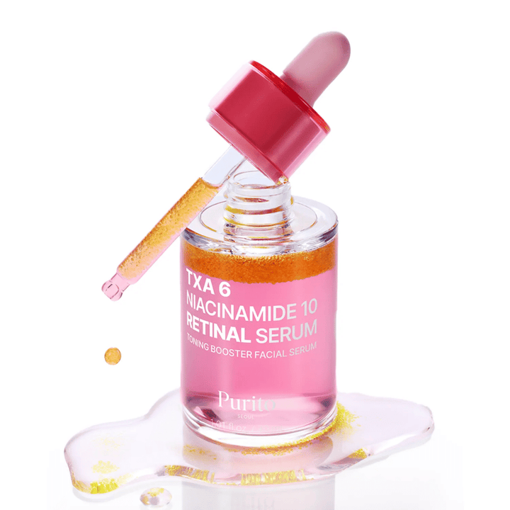 Purito TXA 6 Niacinamide 10 Retinal Serum – rosa toning booster serum med pipett. Kombinerar TXA, niacinamid och retinal för jämn hudton.