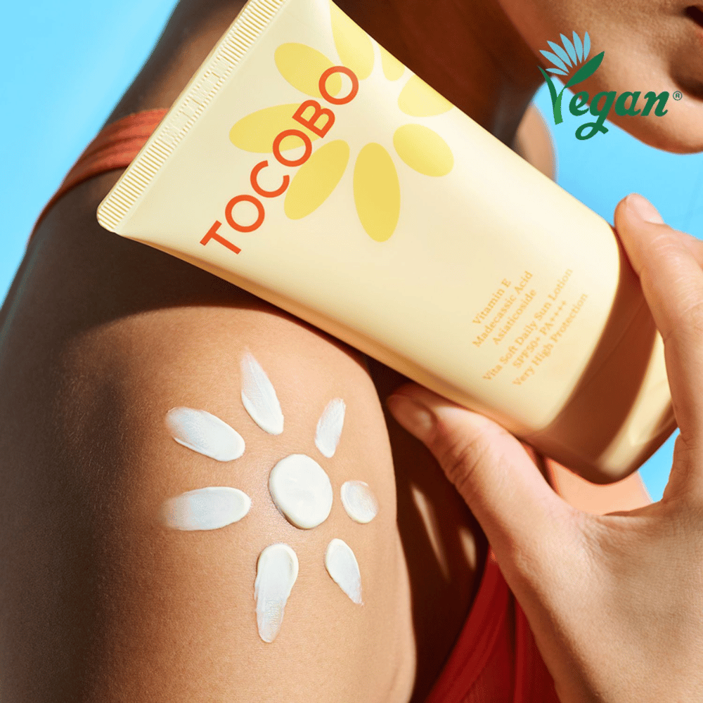 Sunscreen from Tocobo applied evenly on the body for effective UV protection and hydration with a vegan formula