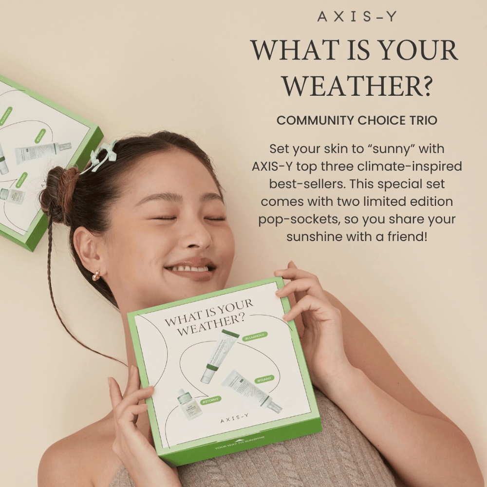 A woman displays AXIS-Y Skincare kit "What is your weather?" which includes three climate-inspired top products and two limited edition pop-sockets to share with a friend.